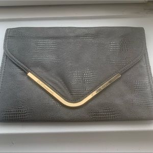 BCBGeneration snakeskin envelope clutch